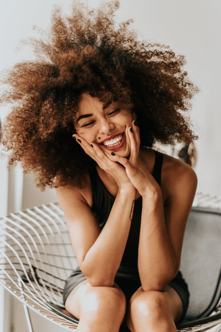 An image of a person smiling and engaging in an active, pain-free lifestyle, such as playing with their children, hiking, or enjoying a recreational activity. The background could feature an outline of a healthy spine, symbolizing the relief offered by chiropractic care.